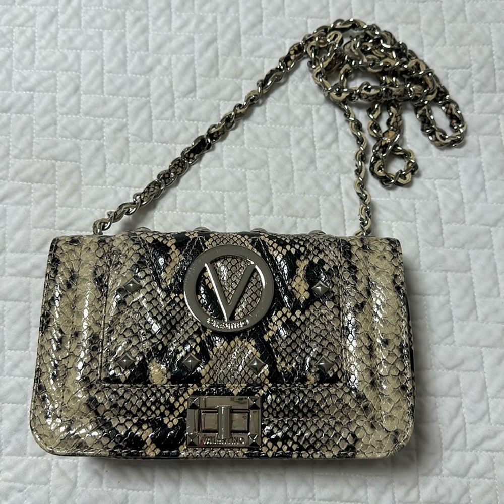 Valentino Handbag Snakeskin print with studs and silver hardware.